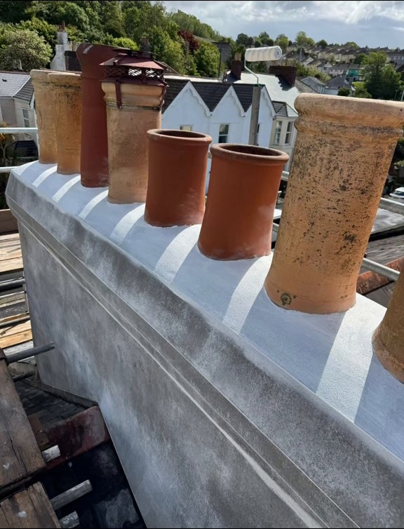 Renewed flaunching around chimney pots